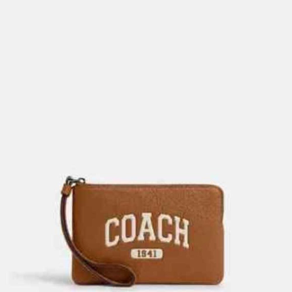 COACH VARSITY PEBBLED LEATHER WRISTLET. N.W.T. !